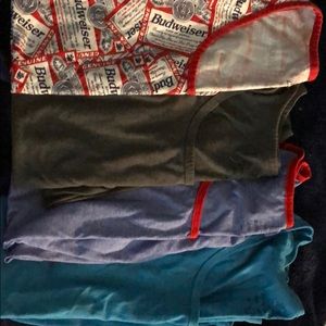 4 Men’s Muscle Tanks